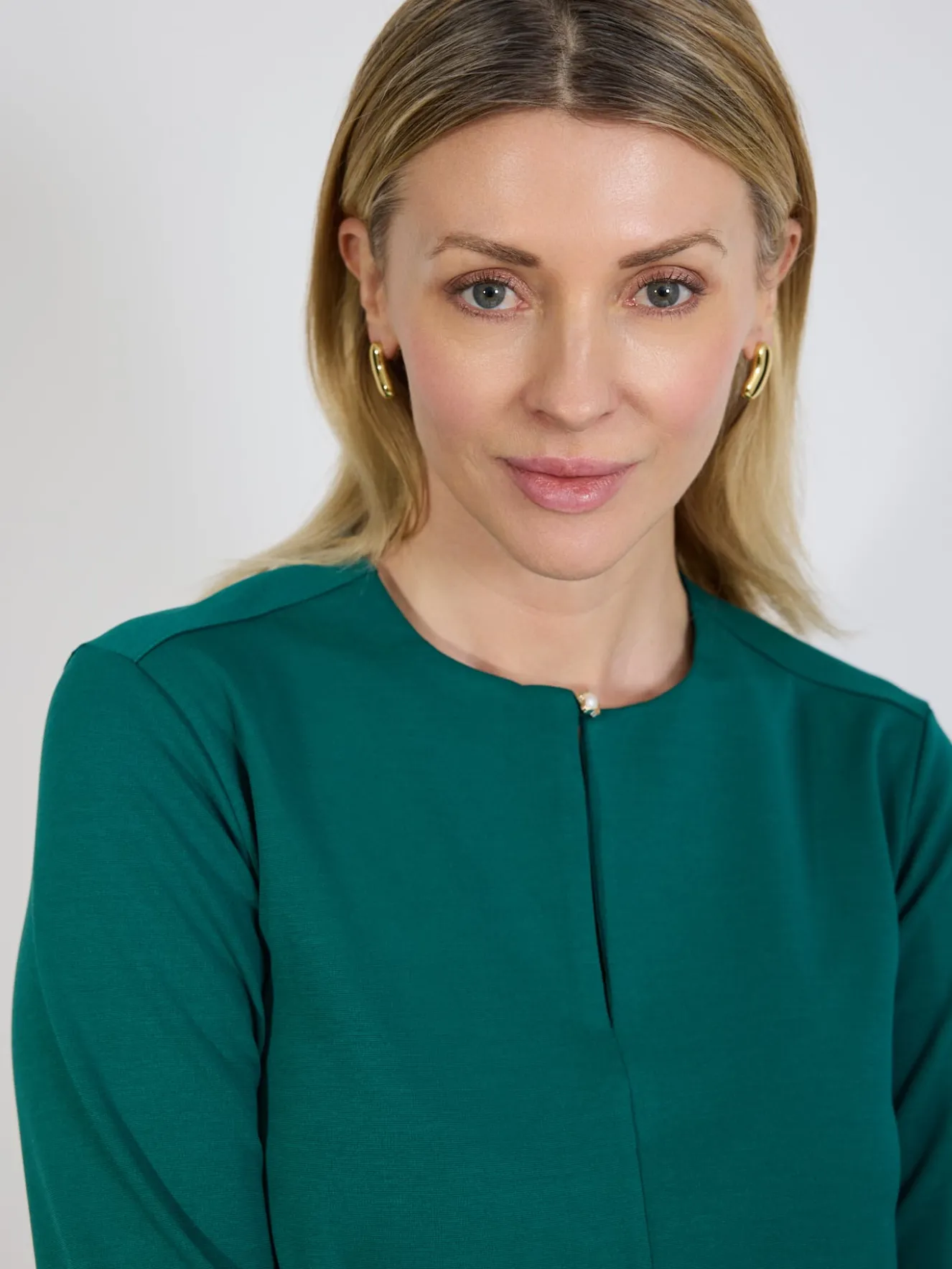 Zielona sukienka trapezowa z rękawem 3/4